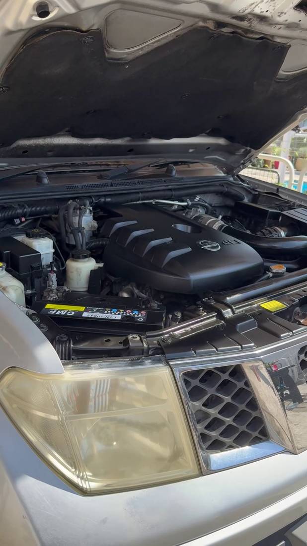 Nissan engine bay after detailing