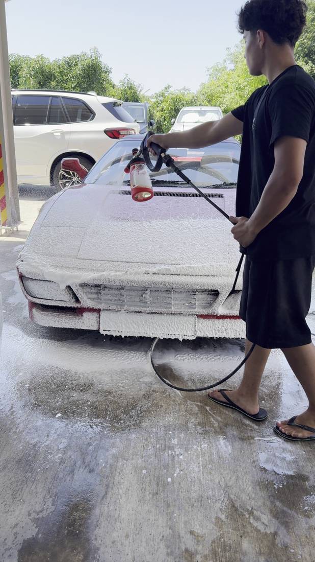 Snow-foam pre-wash on a Ferrari