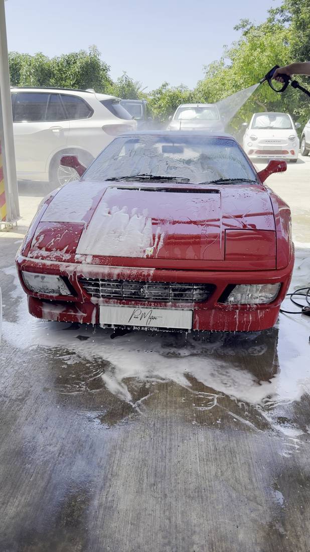 Ferrari snow-foam wash in progress, third view