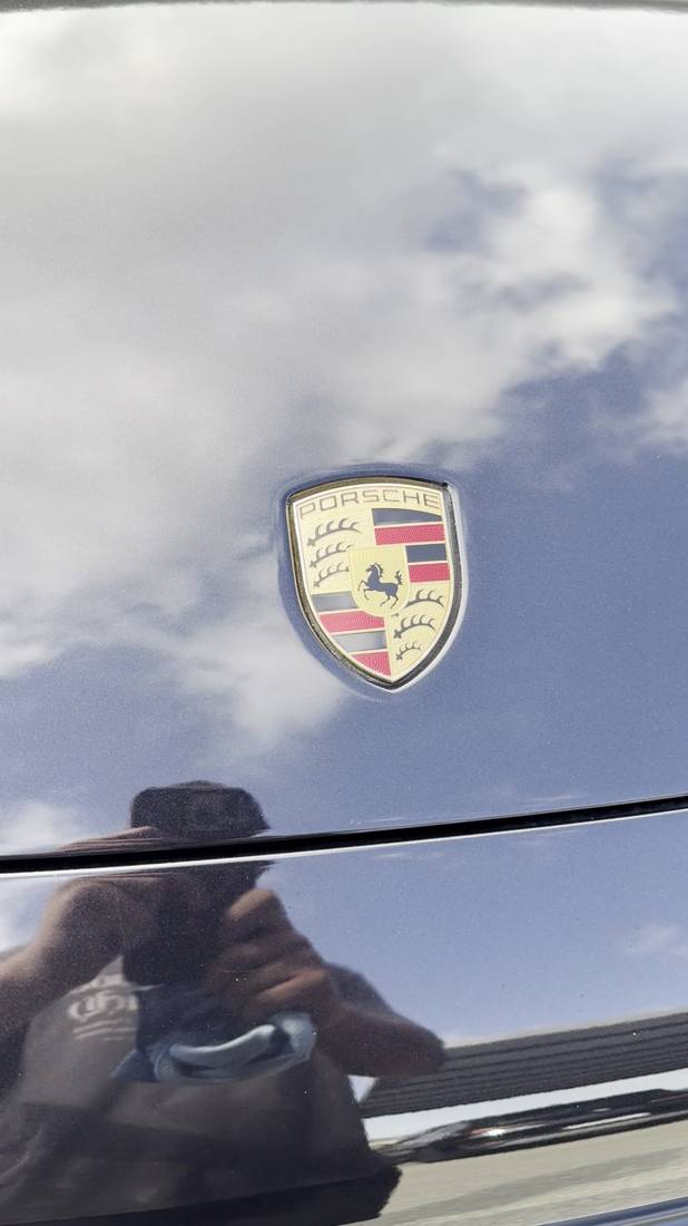 Polishing the Porsche crest by hand